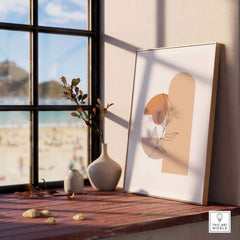 Mid Century print artwork displayed on a windowsill with decorative vases and a beach view in the background.