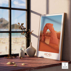 Framed Arches National Park art print displayed indoors, showcasing minimalist design and nature-inspired decor.