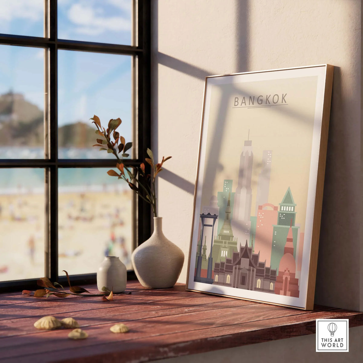 Bangkok Skyline Poster Print displayed indoors with beach view, featuring pastel city architecture in a stylish frame.