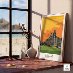 Belfast poster featuring a vintage-style design of the city’s architecture, displayed in a bright room with a sunny view.