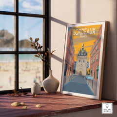 Bordeaux poster print featuring vintage artwork of French architecture, displayed in a stylish interior setting.