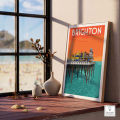 Brighton vintage print poster art framed on a windowsill, capturing the essence of Brighton Pier and summer vibes.