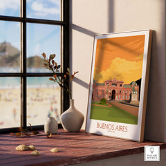 Buenos Aires poster framed on a wooden shelf with beach view, showcasing vintage travel art from This Art World.