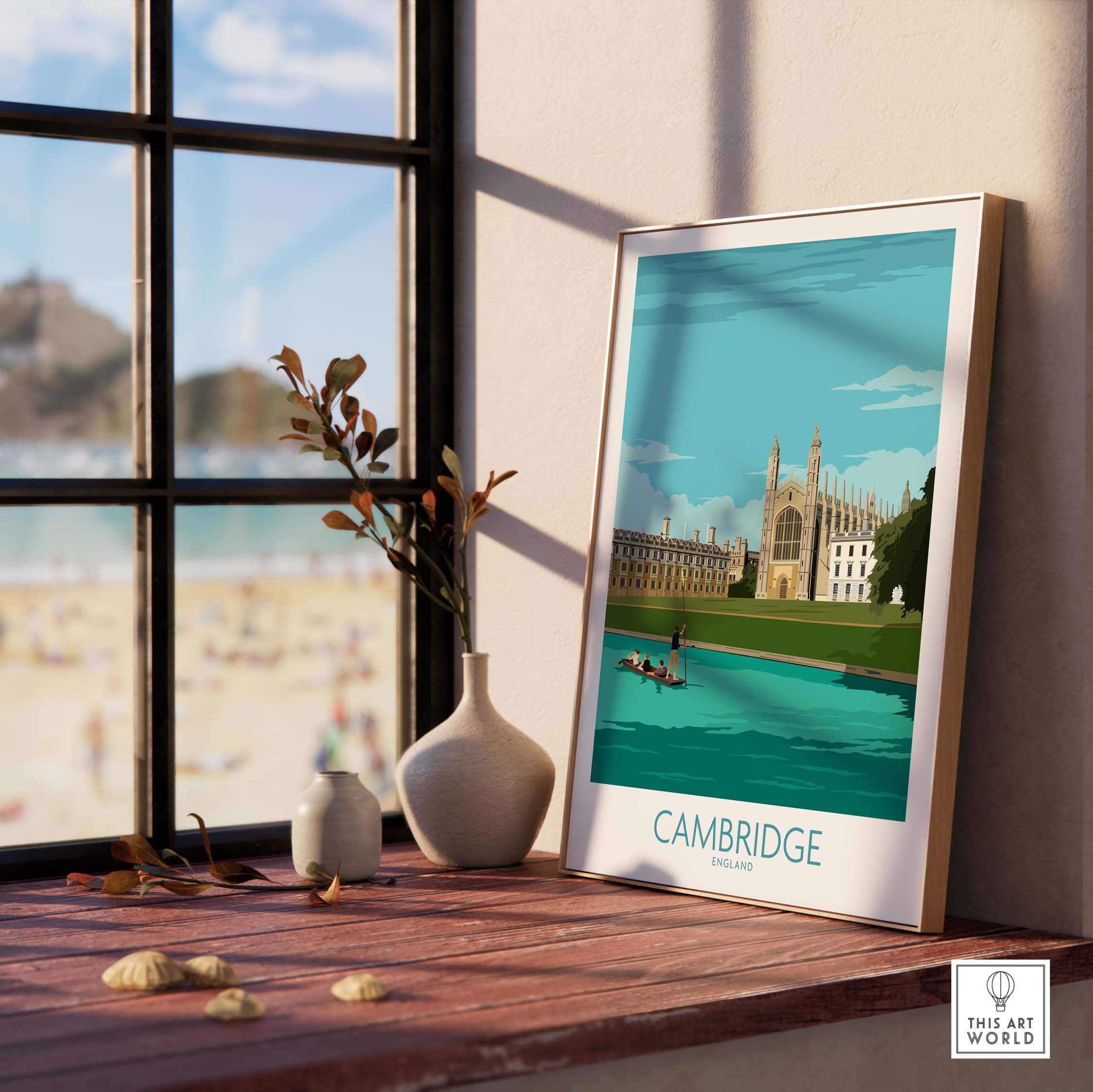 Framed Cambridge Print showcasing King's College, inspired by vintage travel posters, displayed in a coastal home setting.