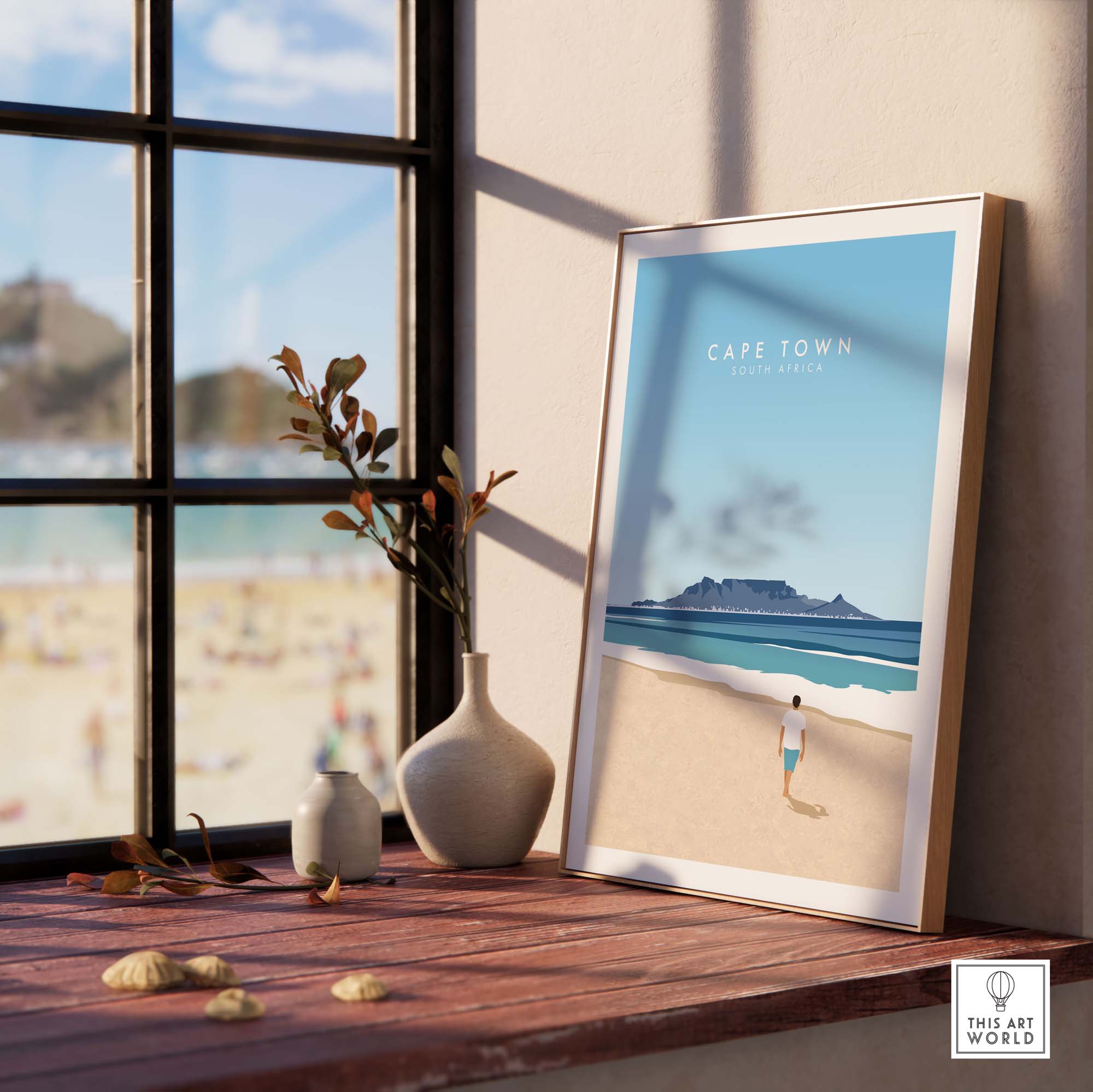 Cape Town print artwork displayed indoors with a beach view, capturing nostalgic travel vibes by This Art World.