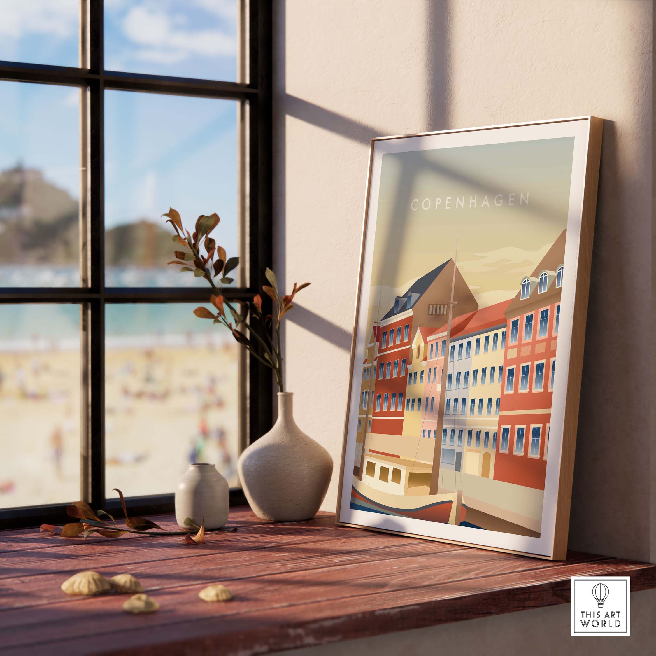 Copenhagen wall art poster displayed on a sunlit table with a vase, showcasing colorful buildings and a beach view.