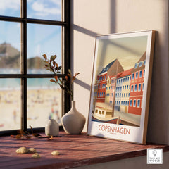 Copenhagen Wall Art print displayed indoors, showcasing vintage-inspired designs and a cozy aesthetic.