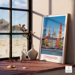 Framed Copenhagen Wall Art Print showcasing colorful buildings and landmarks, perfect for home or office decor.