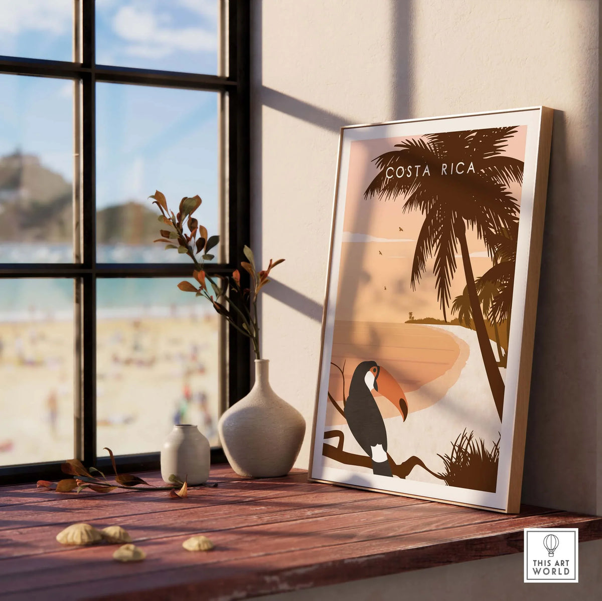 Costa Rica Print Wall Art Poster featuring a toucan and tropical scenery, displayed in a sunlit indoor setting.