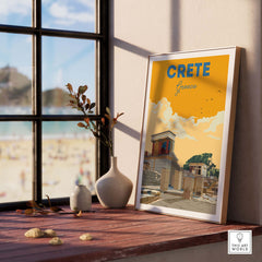 Framed Crete Print Greece poster on a wooden table with beach view, perfect for home decor.