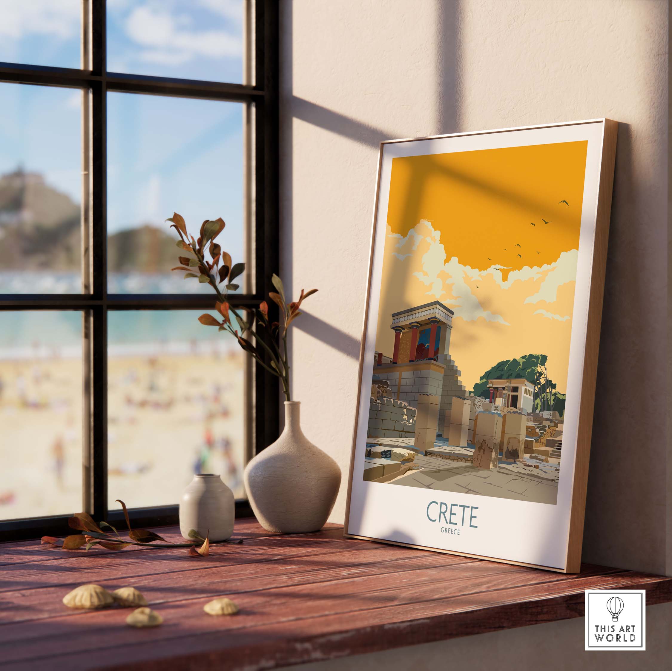 Framed Crete Greece poster on a wooden table, featuring vintage travel art with a coastal view.