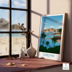 Dubrovnik Poster Art Fine Art Print placed on a wooden desk with a beach view, showcasing modern minimalist design.