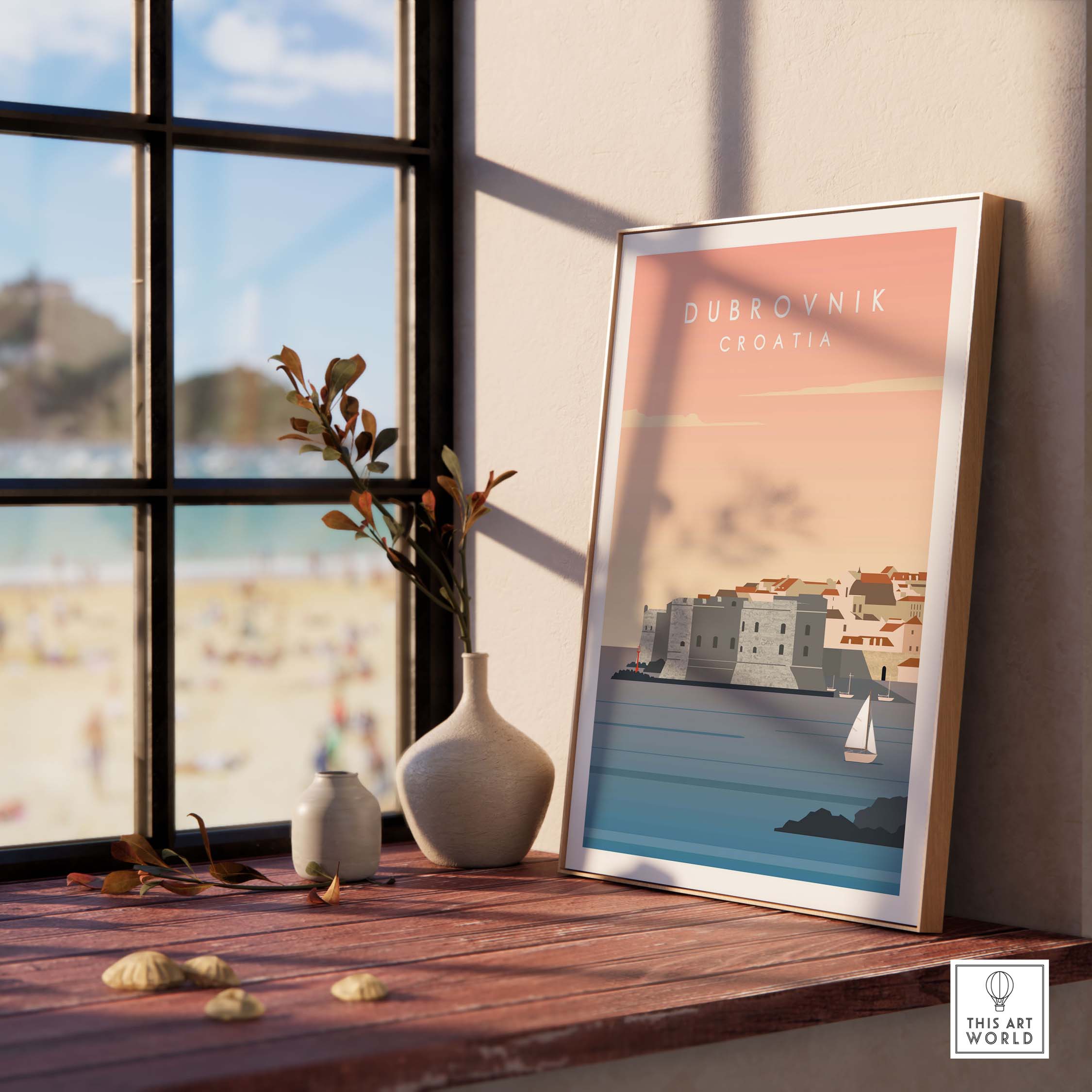 Dubrovnik print wall art poster displayed indoors by a window, featuring a coastal landscape with a sailboat.