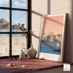 Dubrovnik print travel poster displayed by a window, showcasing vintage-inspired art of the seaside city.