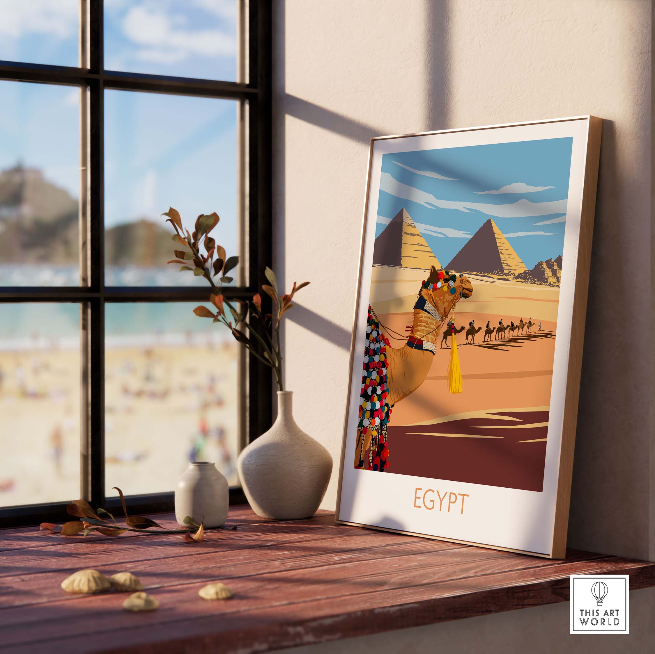 Vintage Egypt poster wall art print featuring pyramids and camel on a sunlit windowsill.