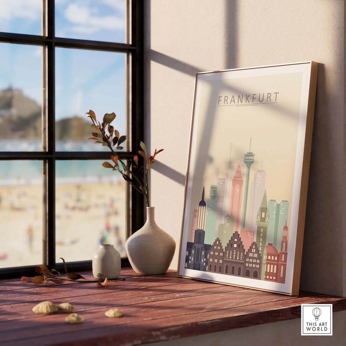 Frankfurt skyline print wall art displayed on a wooden table next to a window, featuring pastel tones and iconic architecture.
