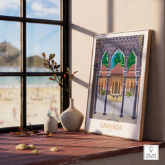 Framed Granada Spain poster print showcasing vintage travel art in a sunlit room with beach view.