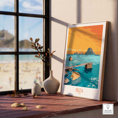Ibiza poster art framed on a wooden table, showcasing vintage travel design and beach scenery.