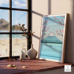 Japan Print Wall Art featuring Mount Fuji, cherry blossoms, and serene beach scene in a stylish frame.