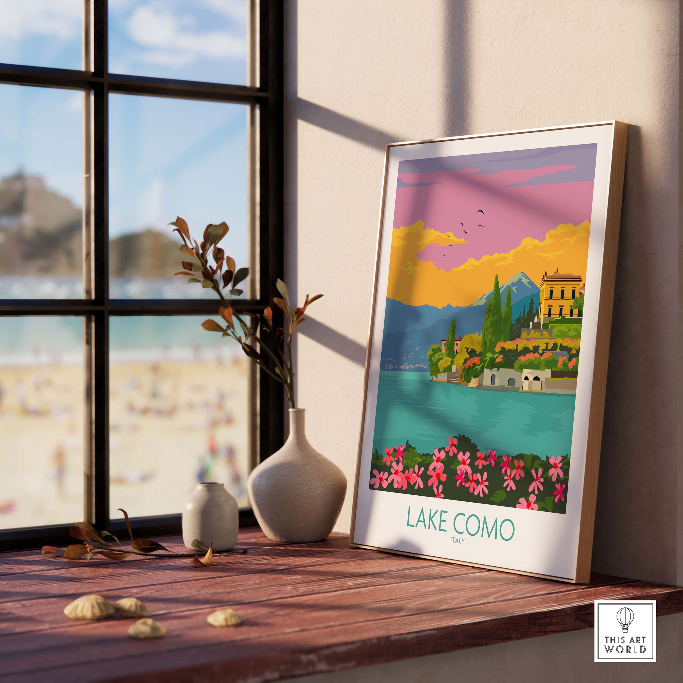 Lake Como Italy poster displayed by a window, featuring colorful scenery and minimalist design.