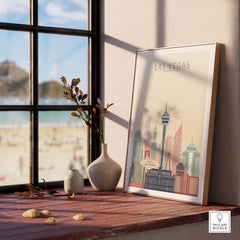 Las Vegas Skyline Poster displayed in a cozy interior, showcasing iconic landmarks in warm pastel tones.