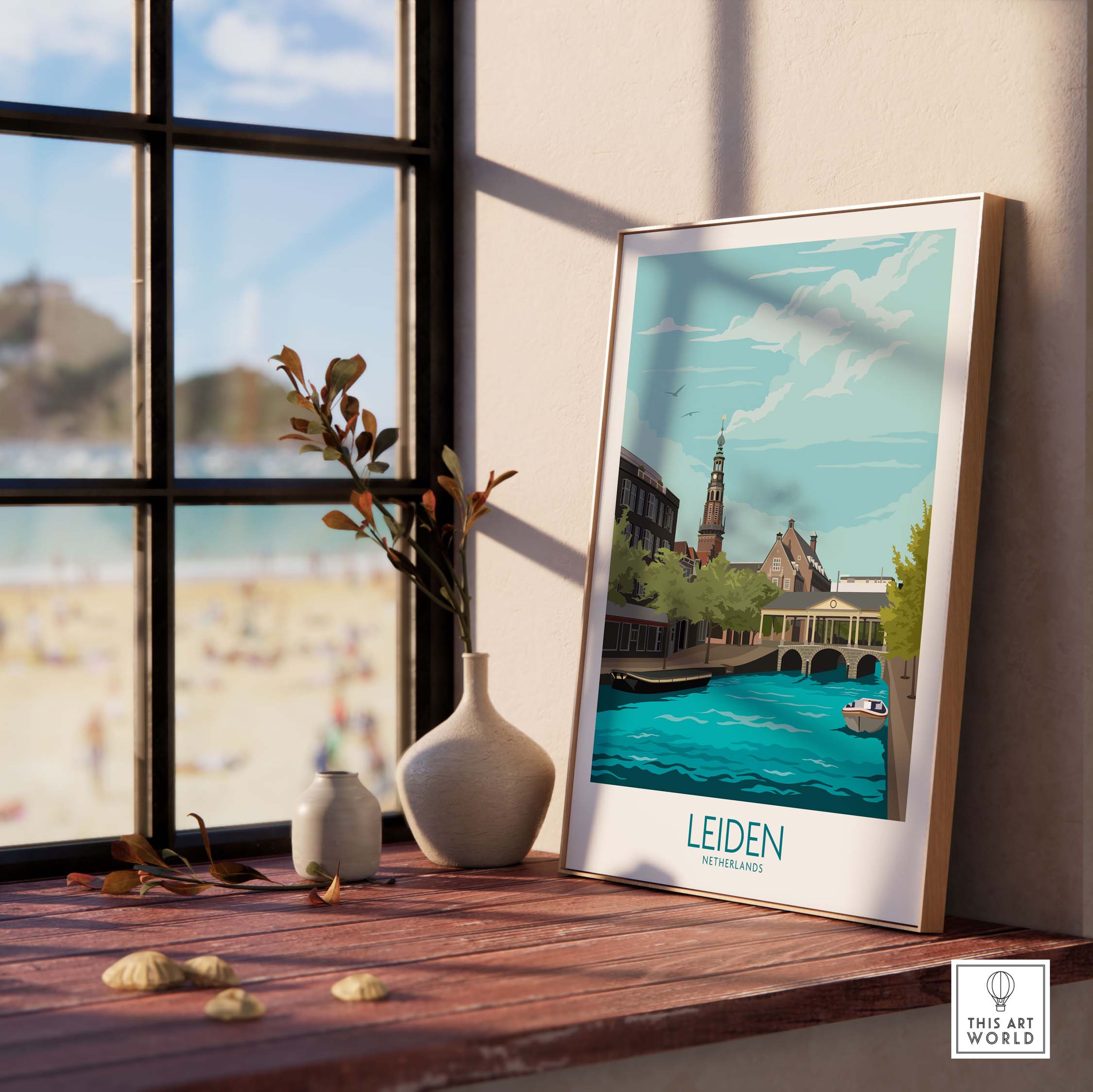 Leiden Poster Netherlands framed on a wooden table, showcasing scenic water and architecture, ideal for home decor.