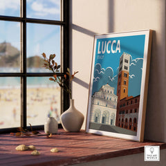 Lucca Poster Italy Wall Art Print displayed in a bright room with a beach view, showcasing vintage travel-inspired design.