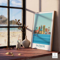 Baltimore travel poster in minimalist style, framed and displayed indoors with a view of a beach.