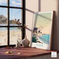 Bonaire Wall Art Print displayed on a wooden table, featuring minimalist design and beach scene.
