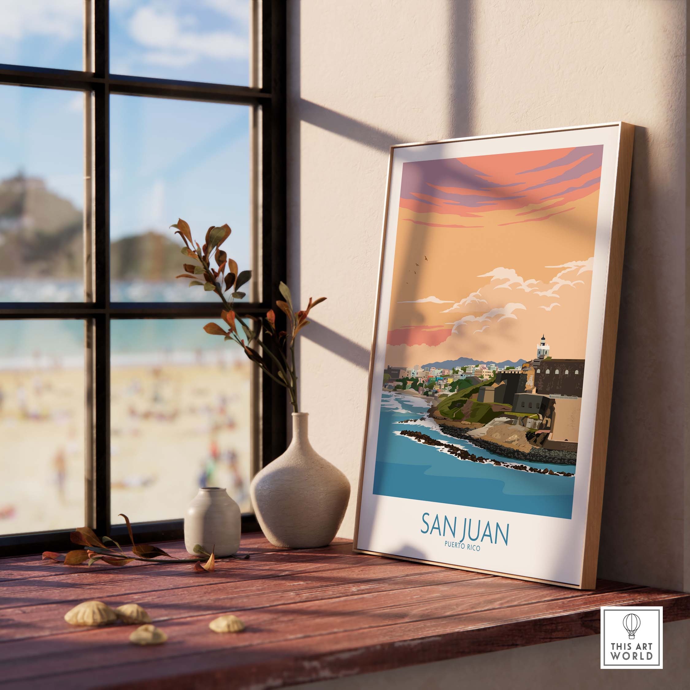 San Juan Puerto Rico Print displayed on a wooden table with a beach view, showcasing vintage travel art.