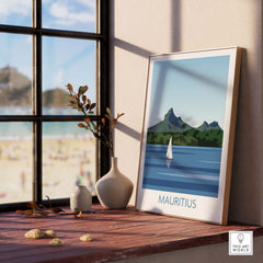 Mauritius travel poster print featuring a sailboat and mountains, displayed in a bright room with a view.