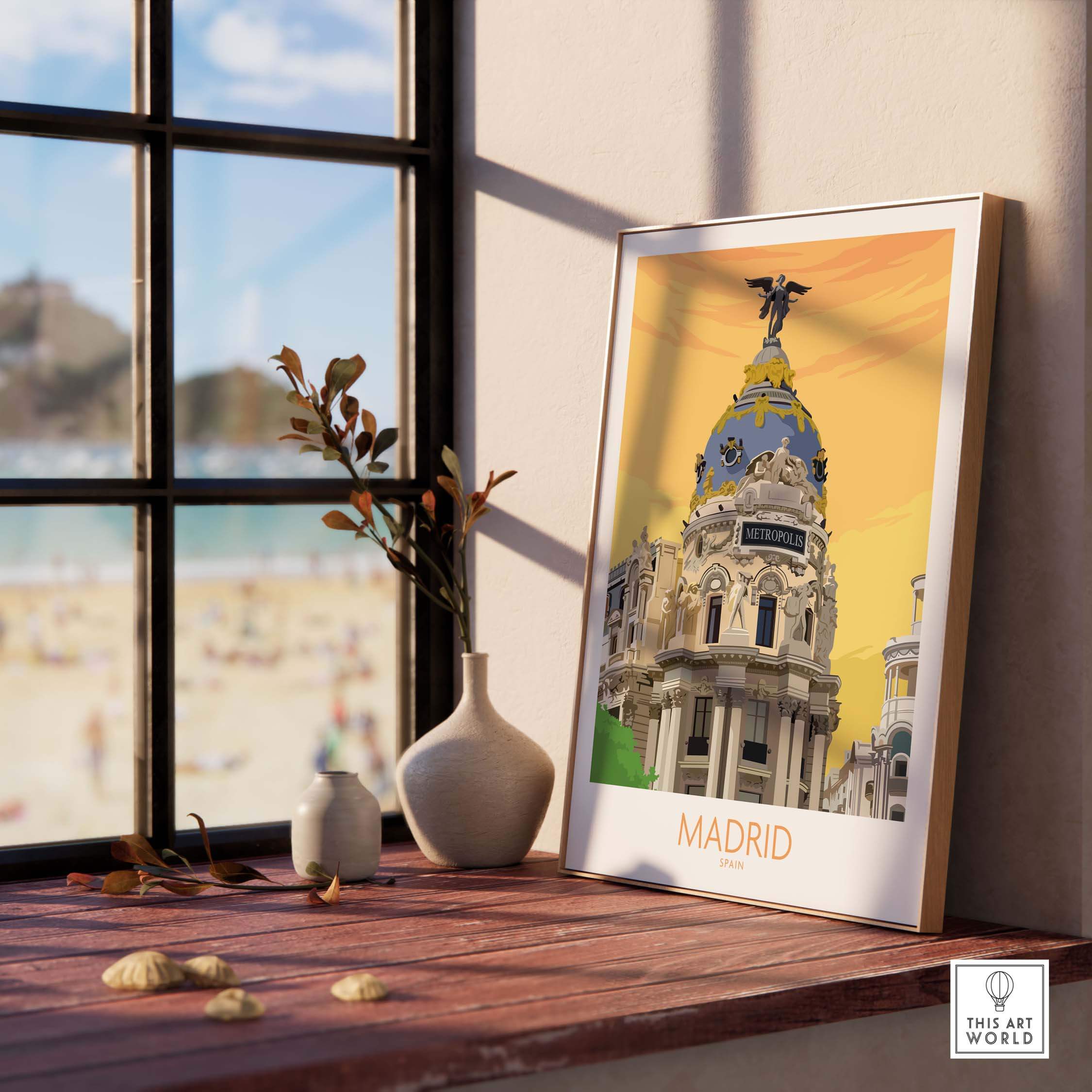 Madrid print poster displayed on a wooden shelf, showcasing a vintage-inspired design of Madrid's iconic buildings.