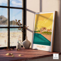 Mallorca poster by This Art World displayed on a windowsill, showcasing vintage travel art inspired by Spain.