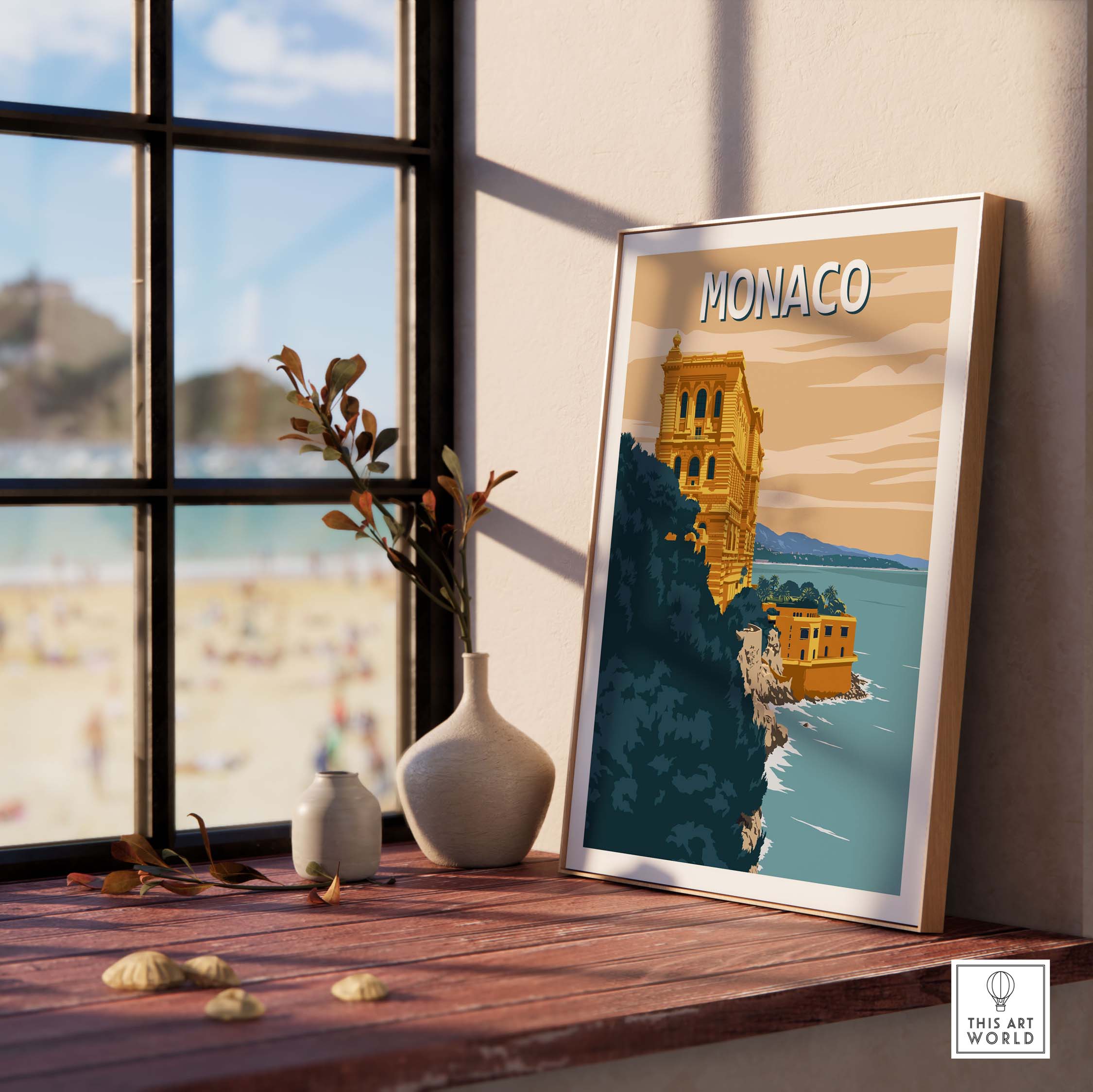 Monaco Wall Art Print featuring a scenic coastal view, framed and displayed on a sunny windowsill.