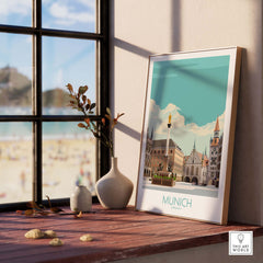 Munich travel poster displayed in a stylish interior setting with clean minimalist design and vibrant colors.