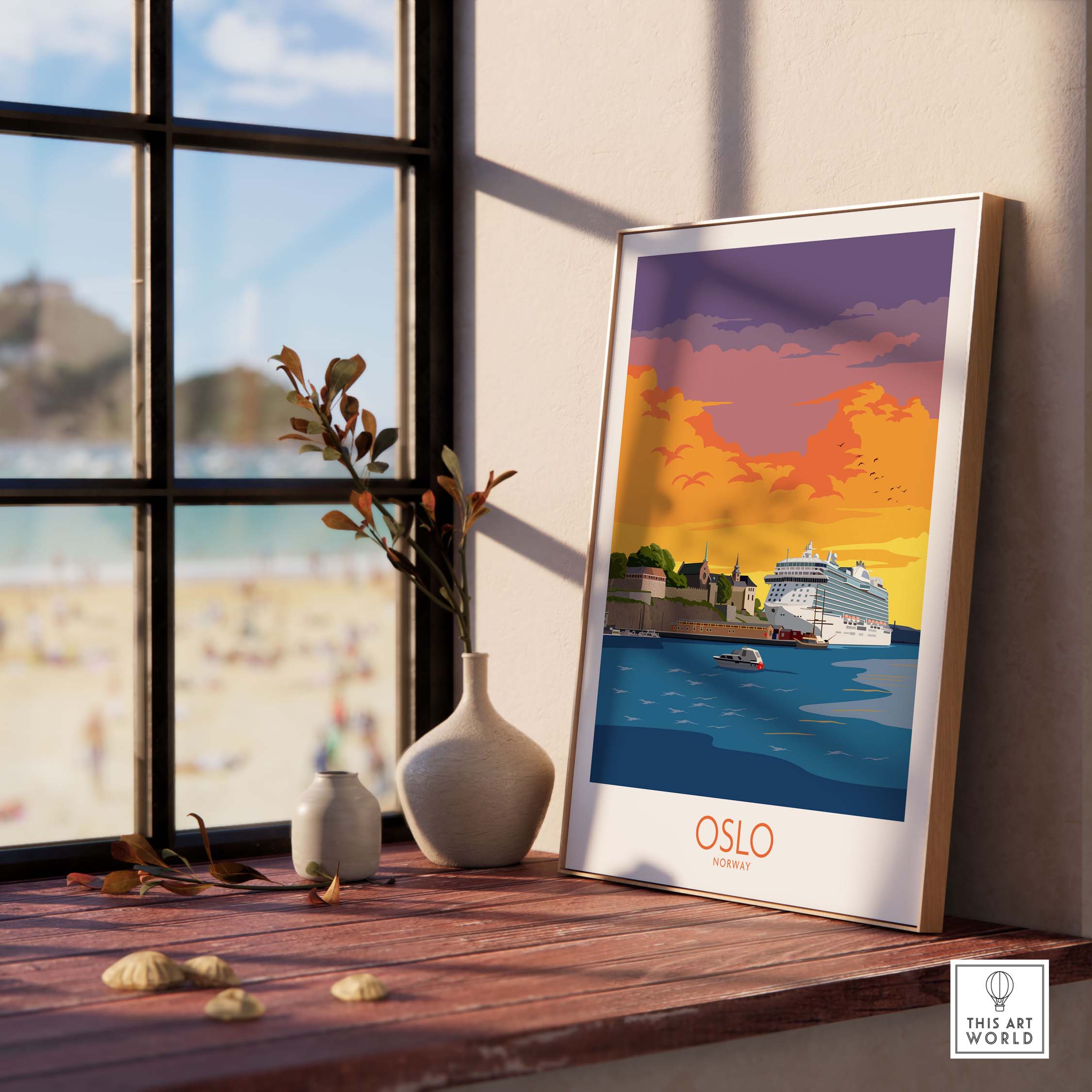 Oslo Poster featuring a scenic sunset view, framed and displayed on a wooden table with beach background.