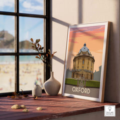 Oxford Print Poster Wall Art featuring a vintage-style illustration of Oxford, England, displayed in a stylish interior.