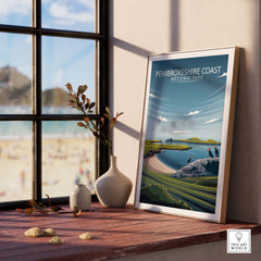 Pembrokeshire Coast National Park print displayed by a sunny window showcasing minimalist art and natural scenery.