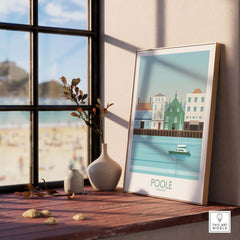 Poole Dorset travel poster print on a windowsill, showcasing scenic coastal artwork and stylish home decor.