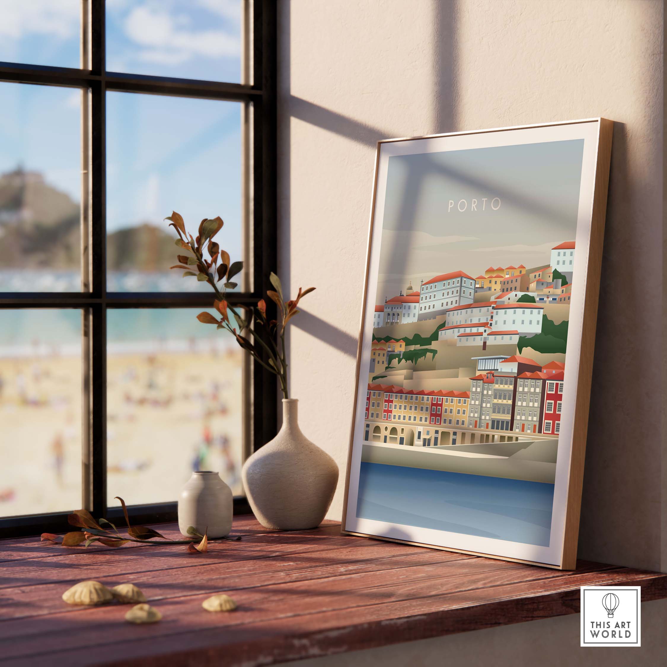 Porto Portugal wall art poster framed on a table near a window with beach view, showcasing vintage travel aesthetics.
