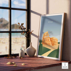 Framed Rome wall art poster featuring the Colosseum, styled decor in a bright room with beach view.