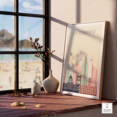 Sacramento Skyline Poster displayed indoors on a wooden table with a window view, showcasing vibrant architectural designs.