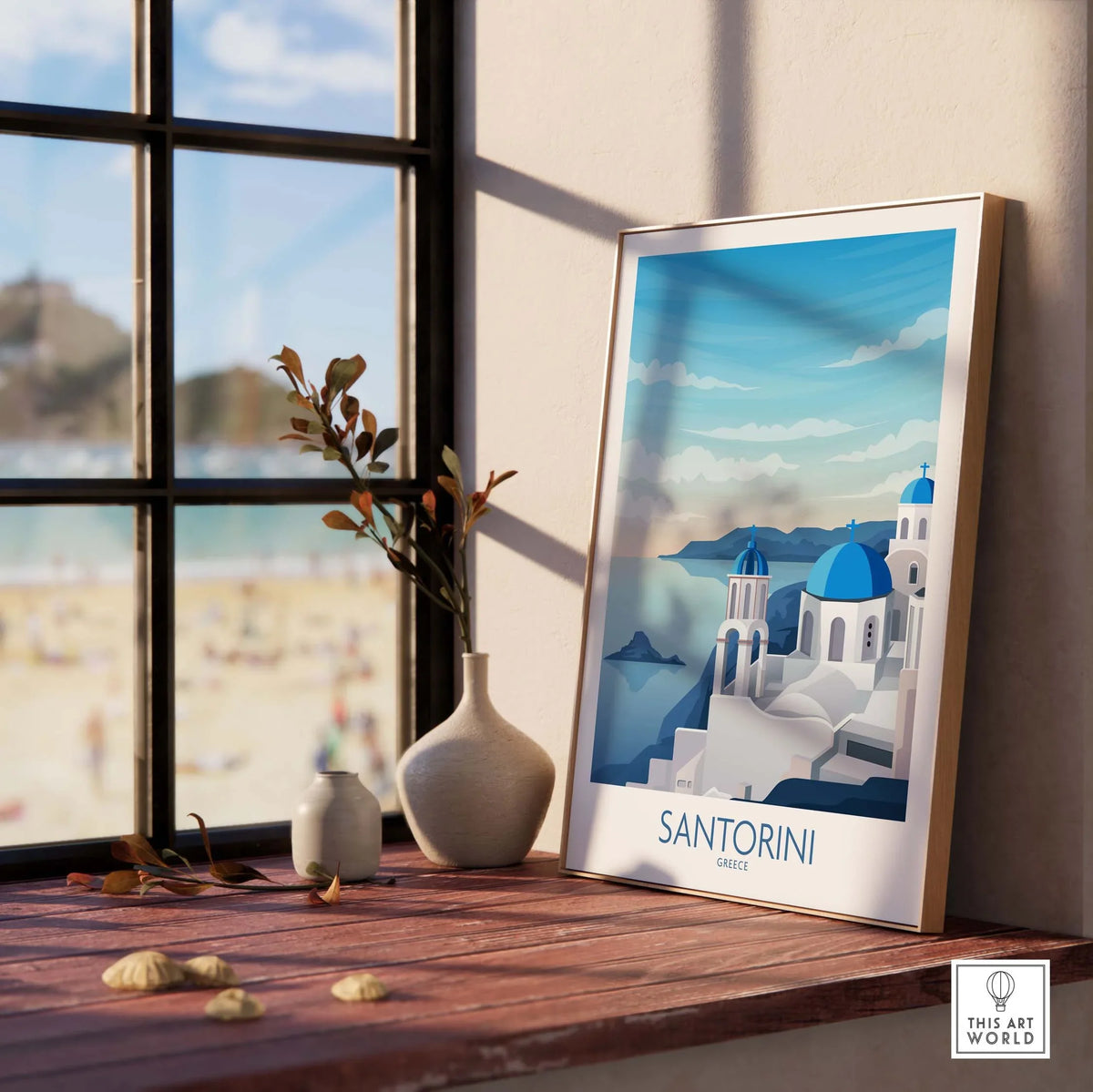 Framed Santorini wall art print showcasing blue domes and sea, perfect for travel decor in home or office.