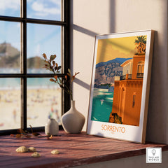 Sorrento Poster Travel Print displayed by a sunny window with beach view, showcasing vintage Italian wall art.