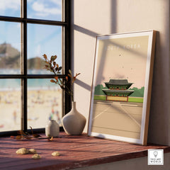 South Korea poster print displayed in a stylish interior with a window view, evoking wanderlust and vintage travel charm.