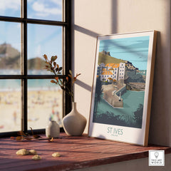 St Ives Cornwall poster print displayed on a windowsill, showcasing coastal scenery and vintage travel art.