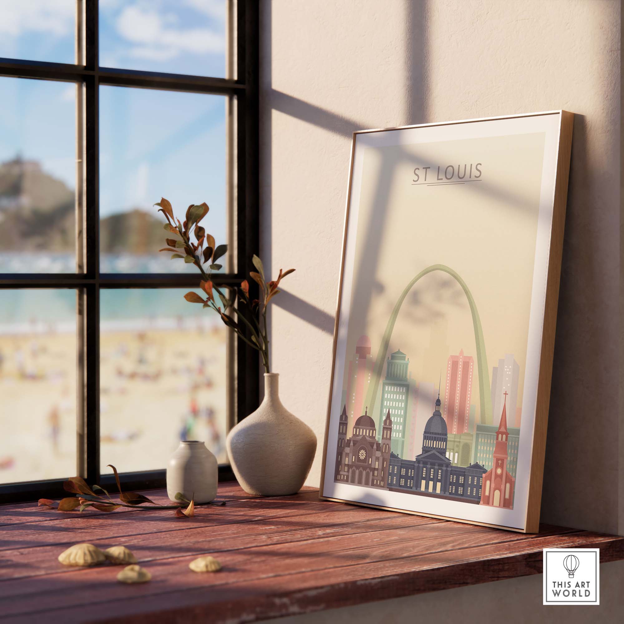 St Louis City Skyline Wall Art Print featuring iconic buildings in pastel colors, framed on a wooden table by a sunny window.