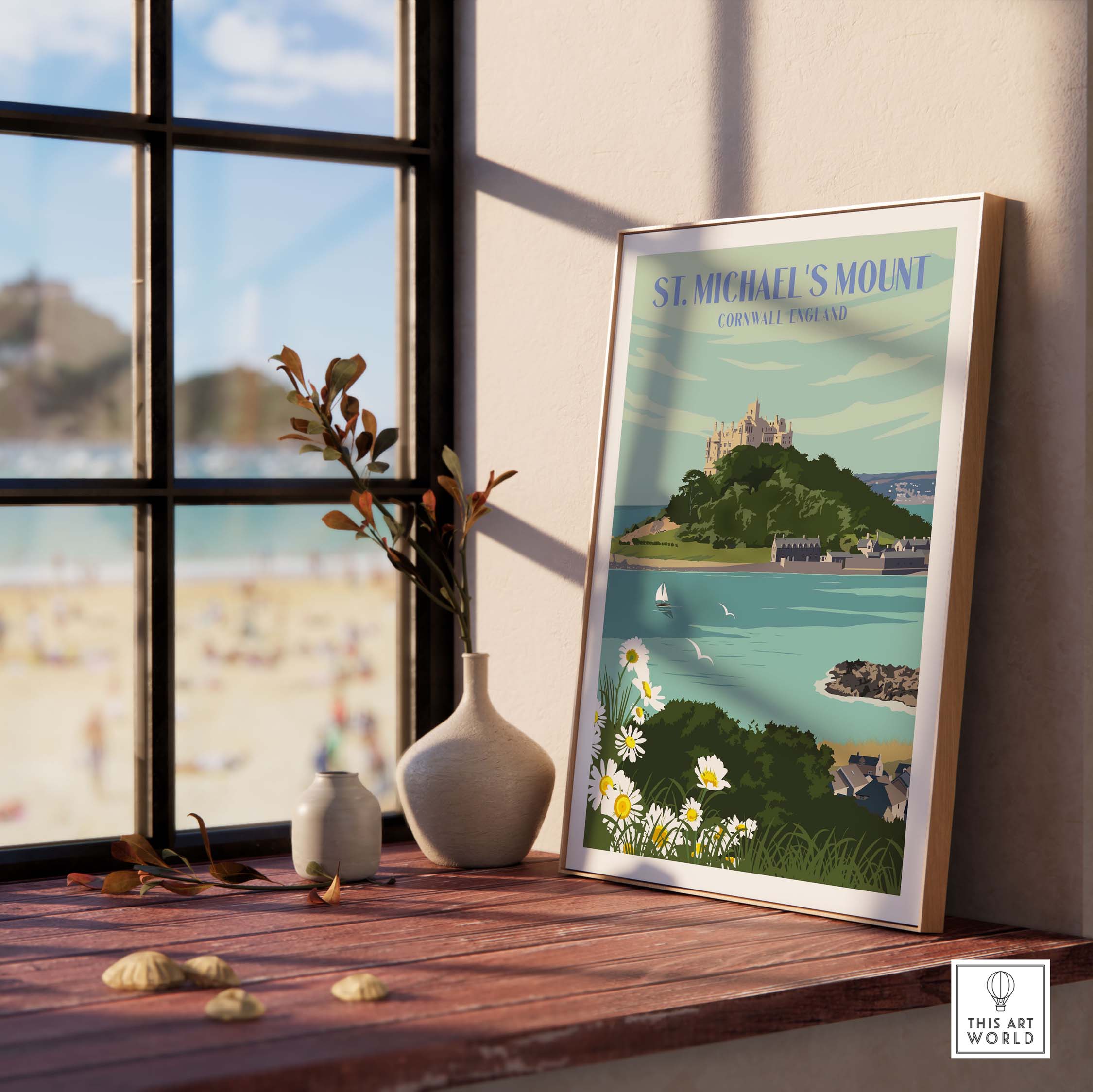 Framed St Michael's Mount print in a sunlit room, featuring vibrant coastal scenery and vintage art style.