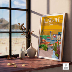 Tenerife poster print wall art displayed near a window, showcasing vintage travel style and coastal view.