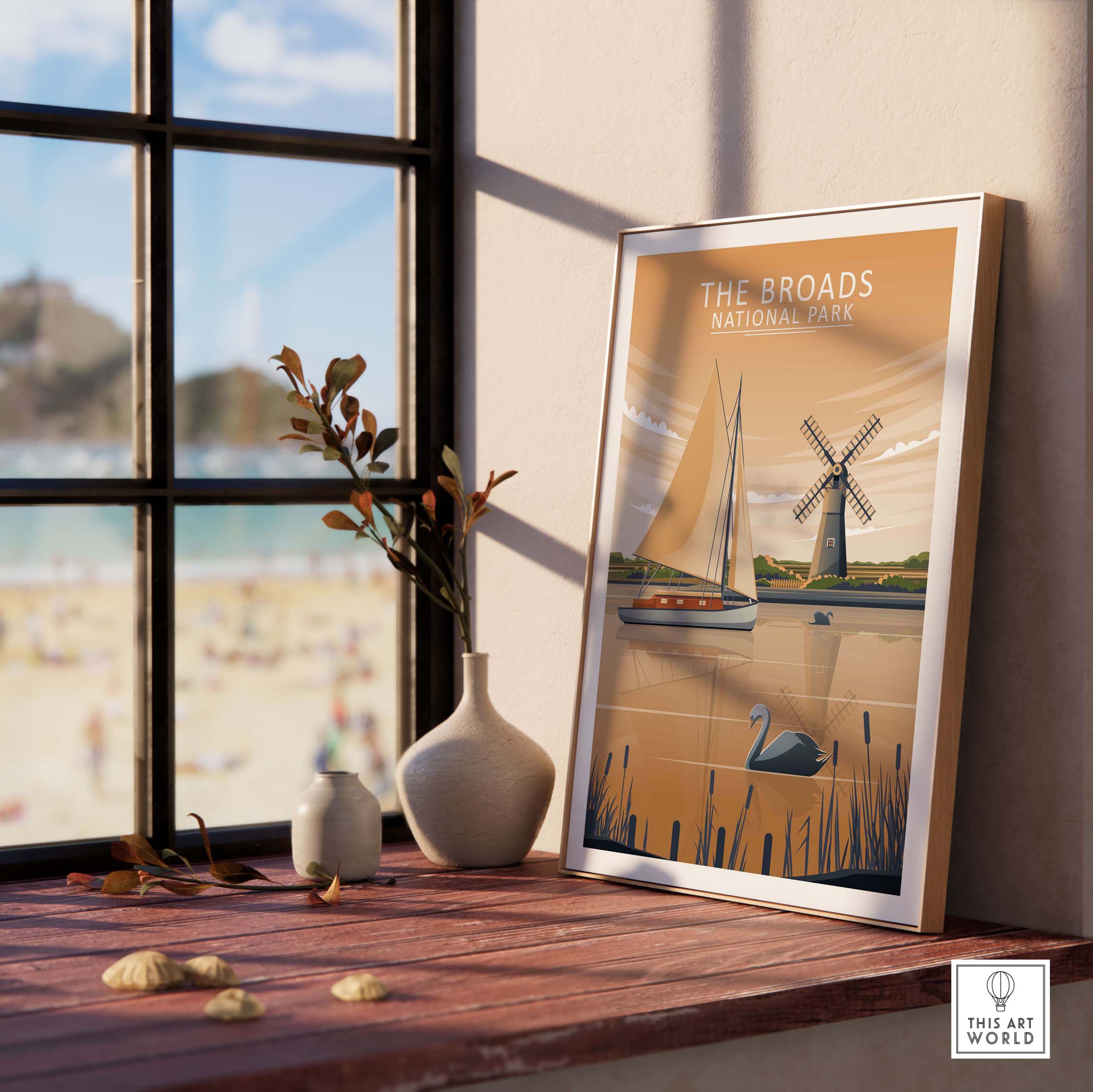 The Broads National Park poster displayed in a stylish interior, featuring a scenic landscape with a lake and windmill.